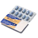 Fildena Super Active 100 mg – blistr modrých kapslí položený na potištěném obalu